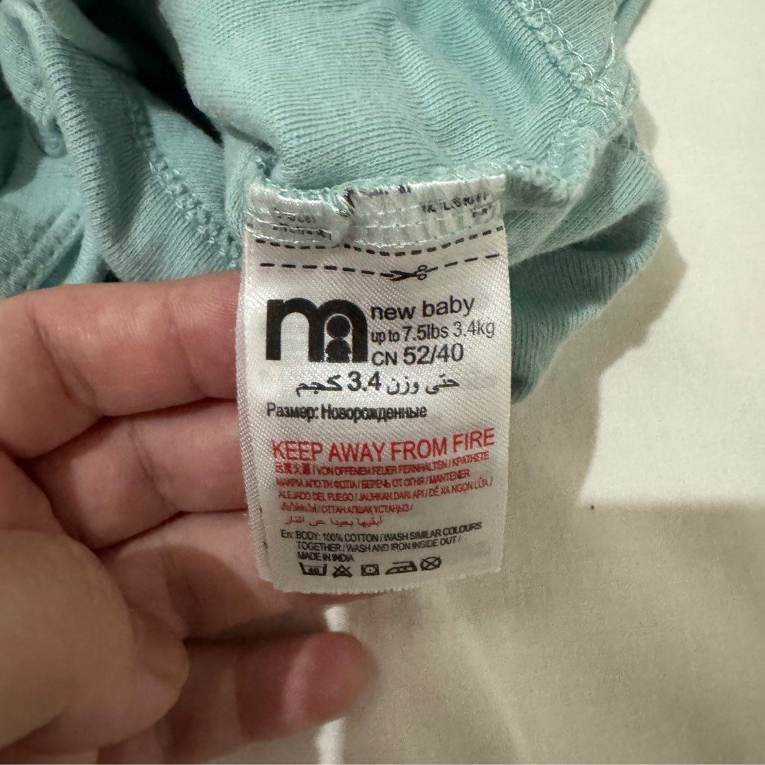 Mothercare Newborn Bodysuits - 4 Pieces (Category: Babies & Kids Fashion) located in Pasig City. Submitted by speciallyselected (Listing ID 1407585973, Image 3). Description: - Set of 4 short-sleeved baby bodysuits - Includes: - Blue polka dot bodysuit - Mustard yellow bodysuit - Patterned bodysuit - Teal bodysuit (labeled "new baby up to 7.5lbs / 3.4kg") - Made of 100% cotton - Perfect for newborns.