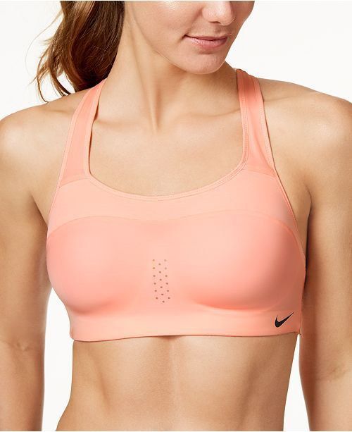 Nike Sports Bra (Category: Activewear) located in Mandaluyong City. Submitted by mclldmrl (Listing ID 1407727525, Image 1). Description: - Nike sports bra - Light pink color - Adjustable straps - Hook-and-eye closure - Mesh panel - Nike logo on front - Made in China - Suitable for high-impact activities.