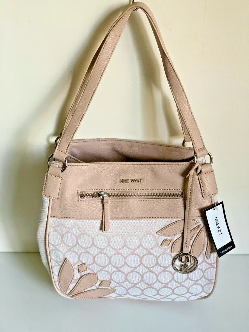 NINE WEST SUMMER SMORES BLUSH PINK TRIPLE ENTRY SATCHEL SHOPPER HOBO BAG $89 (Category: Shoulder Bags) located in San Juan City. Submitted by thesouthbeachedit (Listing ID 1407602791, Image 2). Description: Brand New with Tag! 100% Authentic from the U.S! BRAND: NINE WEST STYLE NAME: SUMMER SMORES COLOR: BLUSH / LKW/CAS FB STYLE NUMBER: 60460850 - C48 RETAIL: US$89 Nine West Summer Smores hobo has three compartments, one zip closure and two with 