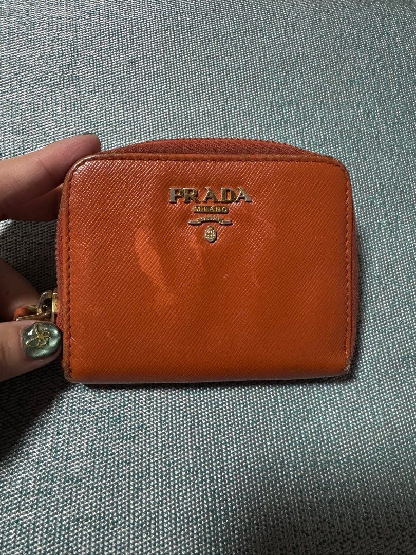 Prada Orange Coin Purse (Category: Luxury Bags & Wallets) located in Davao. Submitted by emeraldjecko (Listing ID 1407582216, Image 1). Description: .
