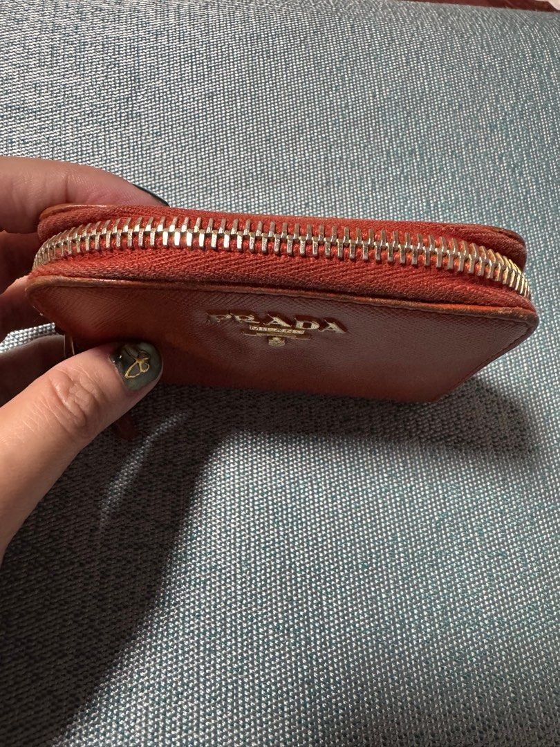 Prada Orange Coin Purse (Category: Luxury Bags & Wallets) located in Davao. Submitted by emeraldjecko (Listing ID 1407582216, Image 3). Description: .