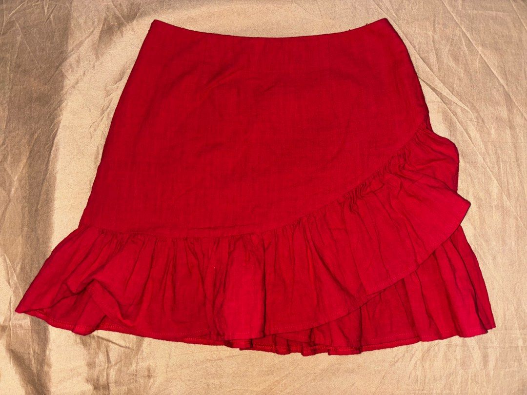 Red Ruffle Mini Skirt (Category: Skirts) located in Angono. Submitted by kalidope (Listing ID 1407741089, Image 2). Description: - Red mini skirt - Ruffle design - Wrap-style front - Comfortable fit - Lightweight fabric - Perfect for warm weather - Dress up or down - can be a costume -.