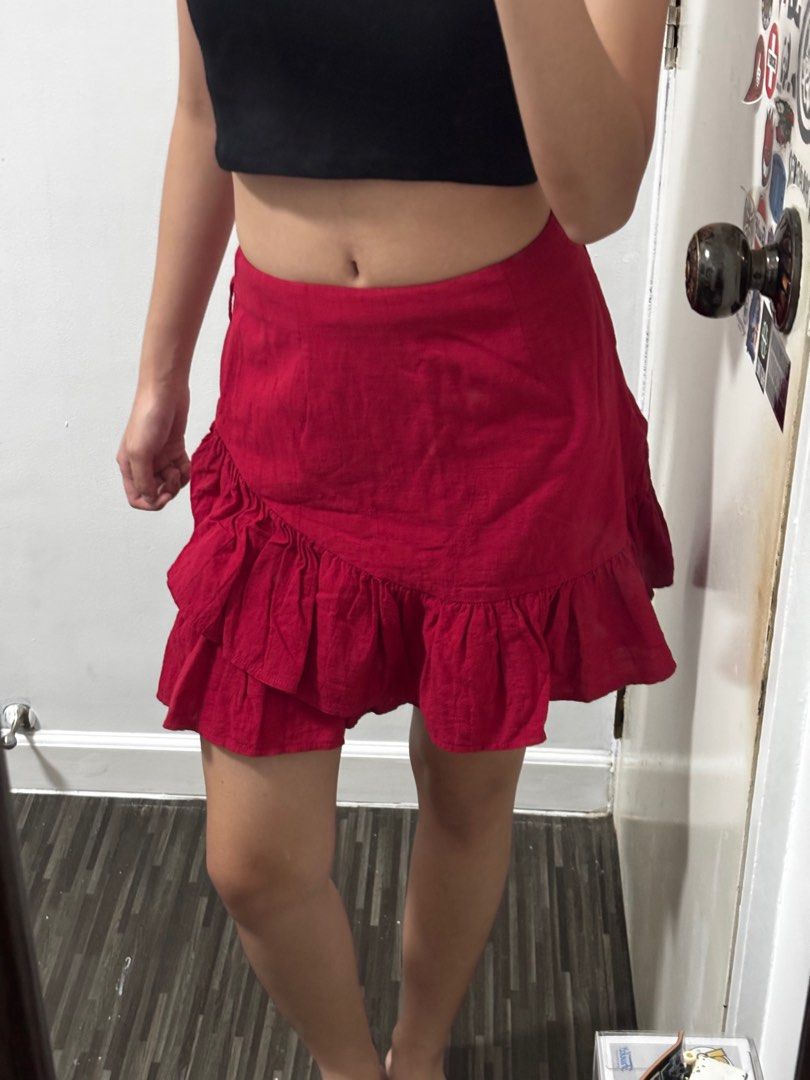 Red Ruffle Mini Skirt (Category: Skirts) located in Angono. Submitted by kalidope (Listing ID 1407741089, Image 1). Description: - Red mini skirt - Ruffle design - Wrap-style front - Comfortable fit - Lightweight fabric - Perfect for warm weather - Dress up or down - can be a costume -.