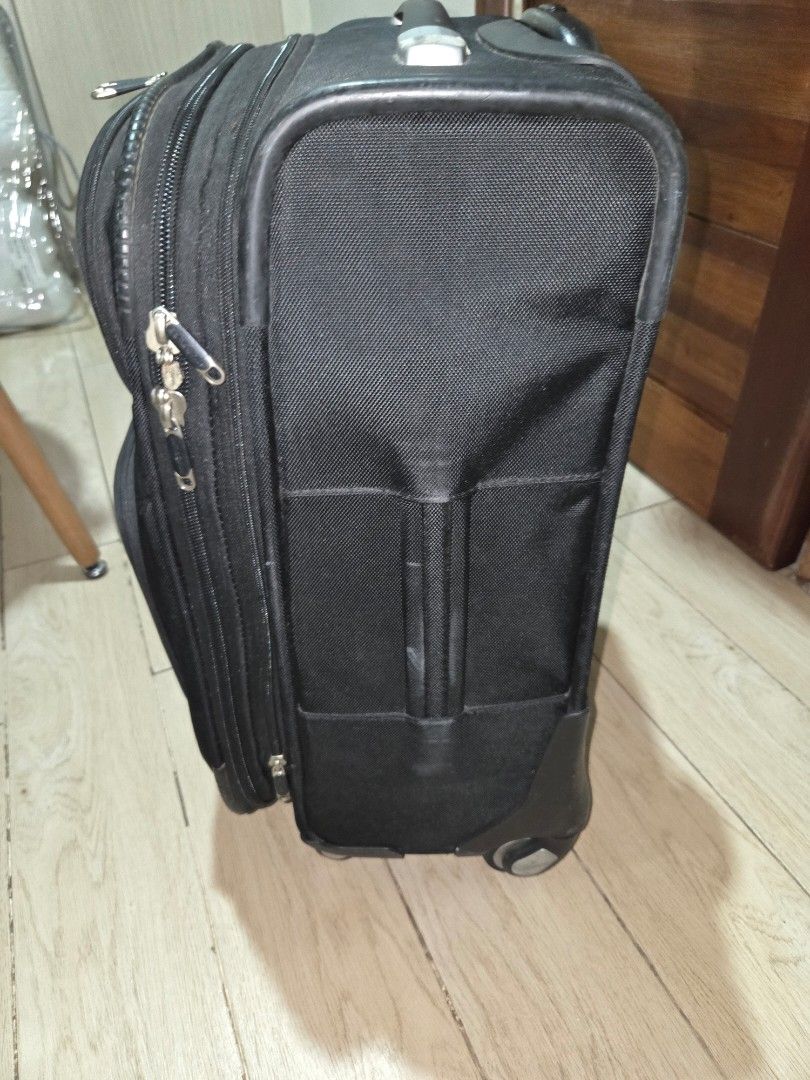 Samsonite Black Luggage (Category: Luggage) located in San Juan City. Submitted by kristinsebastian (Listing ID 1407617671, Image 3). Description: - Black Samsonite luggage - Zipper closure - Durable fabric - Samsonite logo - Handle and wheels for easy transport - Perfect for travel.