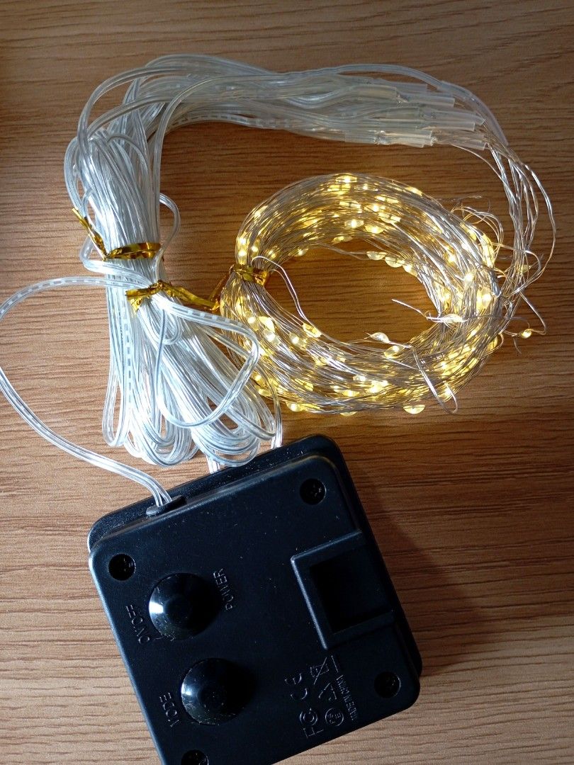 Solar Warm White String Lights 22M 200LED (Category: Lighting) located in Quezon City. Submitted by ana-chan (Listing ID 1407576967, Image 1). Description: This solar string lights offer eight lighting modes and bright warm lights. Fature a user-friendly switch and a sturdy rod with a flexible plate. The super convenient spike allows for easy installation. The panel can be rotated 90 degrees. Each package contains a string of lights, a solar pane