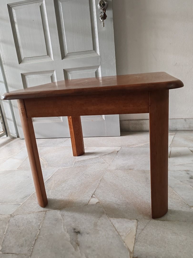 Solid rubber wood square table (Category: Tables & Sets) located in Kuala Lumpur. Submitted by pat03 (Listing ID 1407716144, Image 2). Description: - Square solid wood table - Warm brown finish - Four sturdy legs - Rounded edges (baby/kids friendly) - Versatile: side table or coffee table - Can also be used as side or bedside table - Fits various interior styles - 2ft by 2ft, height 18.5 inch.