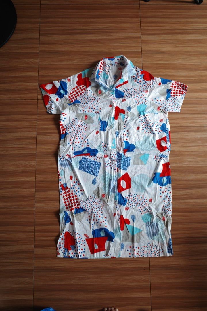 Vintage Printed Dress (Category: Dresses) located in Makati City. Submitted by bluelocker (Listing ID 1407653219, Image 1). Description: - Vintage shirt - Unique red, blue, and white print - Short sleeves - Collared neckline - Button-down front - Lightweight fabric - Relaxed fit - Chest pocket - Perfect for warm weather.