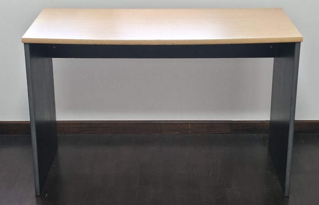 Tidy Study Table (Category: Tables & Sets) located in Singapore. Submitted by coolseabreeze (Listing ID 1407755597, Image 1). Description: - Black frame with light wood-colored tabletop - Sturdy and ready for immediate use - Perfect for students or compact workspaces - Simple and functional design - Dimensions (approx) : 110cm x 50cm 75cm .