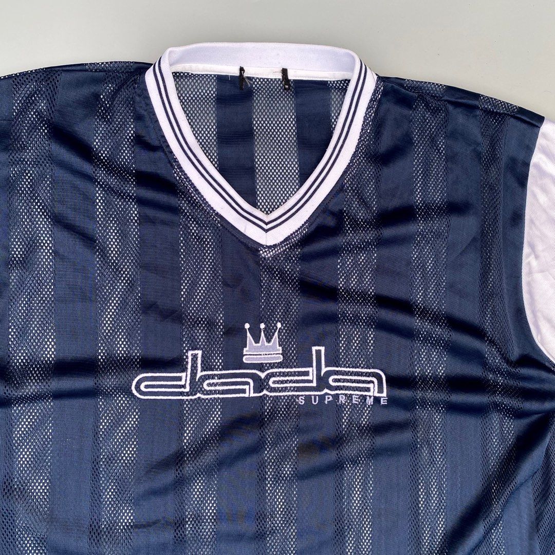 Y2K Dada Supreme Jersey (Category: Tshirts & Polo Shirts ) located in Imus. Submitted by fndsvntg_307 (Listing ID 1407705591, Image 2). Description: - Navy blue and white Dada Supreme jersey - White sleeves with black stripes - Embroidered Dada Supreme logo on the chest - cut tag - excellent condition Price: 1,500.