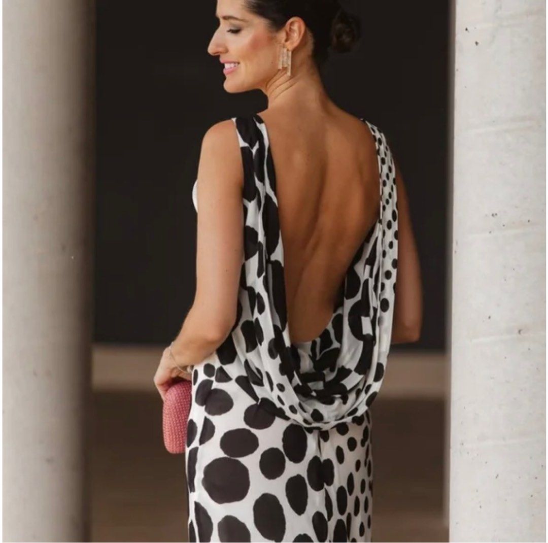 Zara Collection Polka Dot Long Dress (Category: Dresses) located in Mandaluyong City. Submitted by camiwears (Listing ID 1407730014, Image 2). Description: - ZW Collection long dress - Black and white polka dot pattern - Unique open back - Lightweight, flowing fabric - Ideal for special events and evenings.