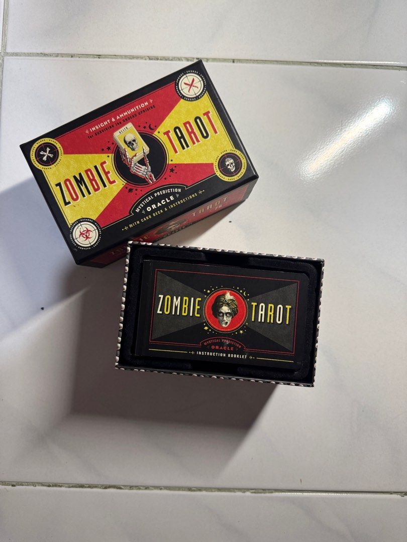 Zombie Tarot Deck (Category: Card Packs) located in Las Pinas. Submitted by gaywizardartist (Listing ID 1407743397, Image 2). Description: Originally bought for 1,100 (FullyB00ked). RFS: Need funds for tuition fee. I do not really use it. NON NEGOTIABLE Edged in Red using Sharpie Marker Location: Las Piñas City J&T, Lalamove. GCash Payment Only.