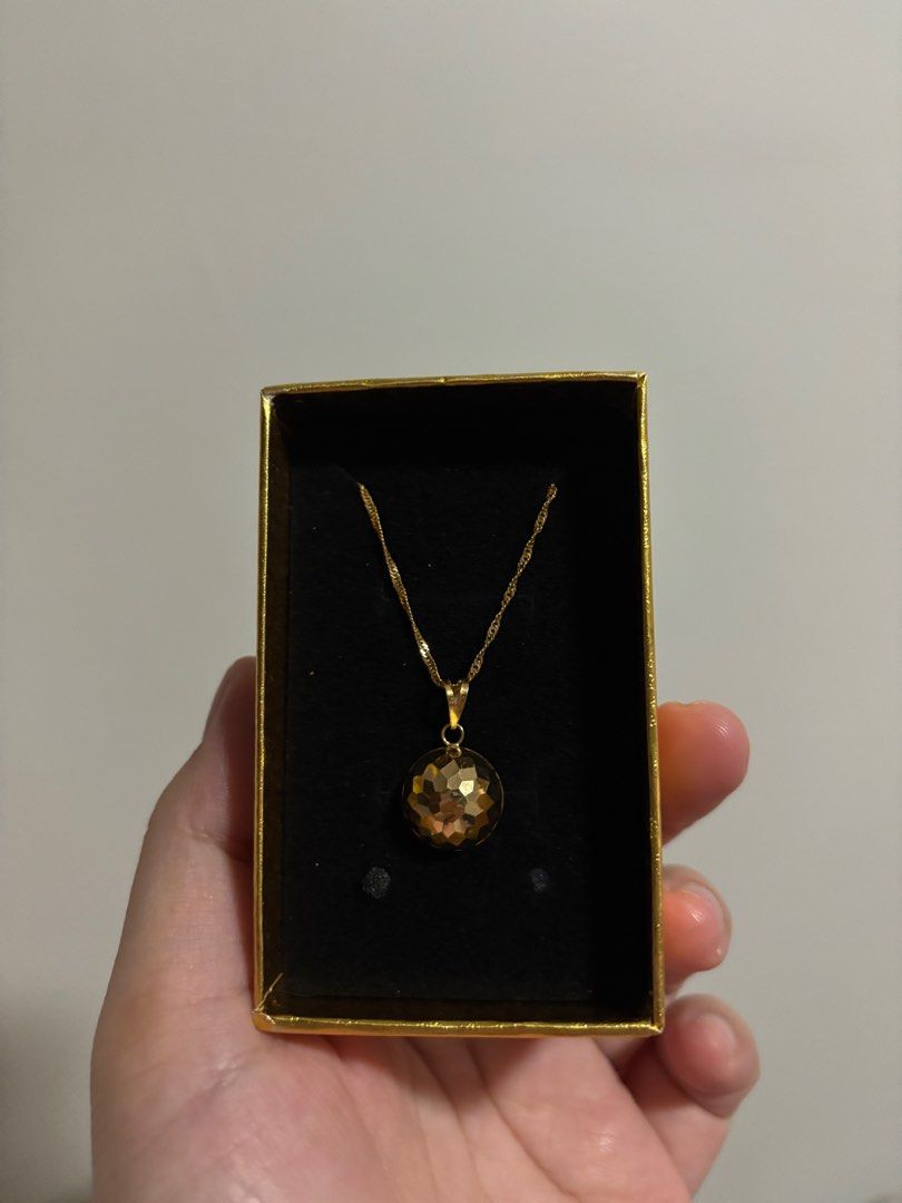 21K Gold Necklace with Pendant (Category: Necklaces) located in Manila. Submitted by ms_j_ (Listing ID 1412662285, Image 2). Description: - 21K Gold Necklace - Delicate chain design - Includes a gold-colored box - Weight: 2.52g - 18 inches.