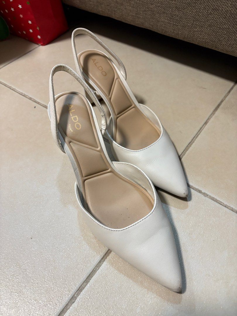 Aldo White Slingback Heels (Category: Heels) located in Pasay City. Submitted by apgavi (Listing ID 1412644460, Image 3). Description: - Aldo slingback heels - White color - Size 6.5 - Pointed toe - Block heel - Includes original box -Used as bridal shoes for my wedding in December 2025:) -Retail price is 5,295.