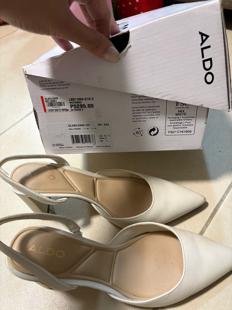 Aldo White Slingback Heels (Category: Heels) located in Pasay City. Submitted by apgavi (Listing ID 1412644460, Image 2). Description: - Aldo slingback heels - White color - Size 6.5 - Pointed toe - Block heel - Includes original box -Used as bridal shoes for my wedding in December 2025:) -Retail price is 5,295.