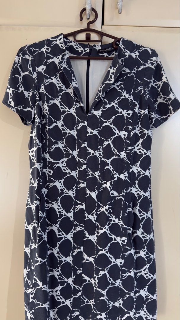 Balenciaga Silk Dress (Category: Dresses) located in Taguig. Submitted by aopreloveditems (Listing ID 1412550244, Image 1). Description: - Balenciaga dress - Unique black and white pattern - Features a V-neckline - Short sleeves - Suitable for various occasions - Fits small to medium frame MOP: BPI, GCash.
