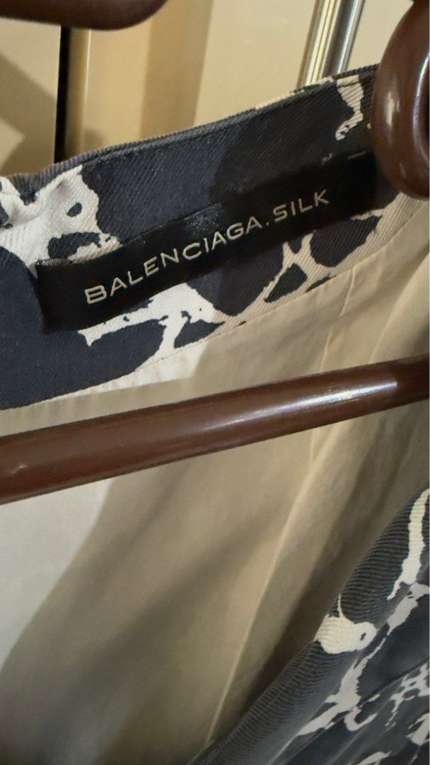 Balenciaga Silk Dress (Category: Dresses) located in Taguig. Submitted by aopreloveditems (Listing ID 1412550244, Image 2). Description: - Balenciaga dress - Unique black and white pattern - Features a V-neckline - Short sleeves - Suitable for various occasions - Fits small to medium frame MOP: BPI, GCash.
