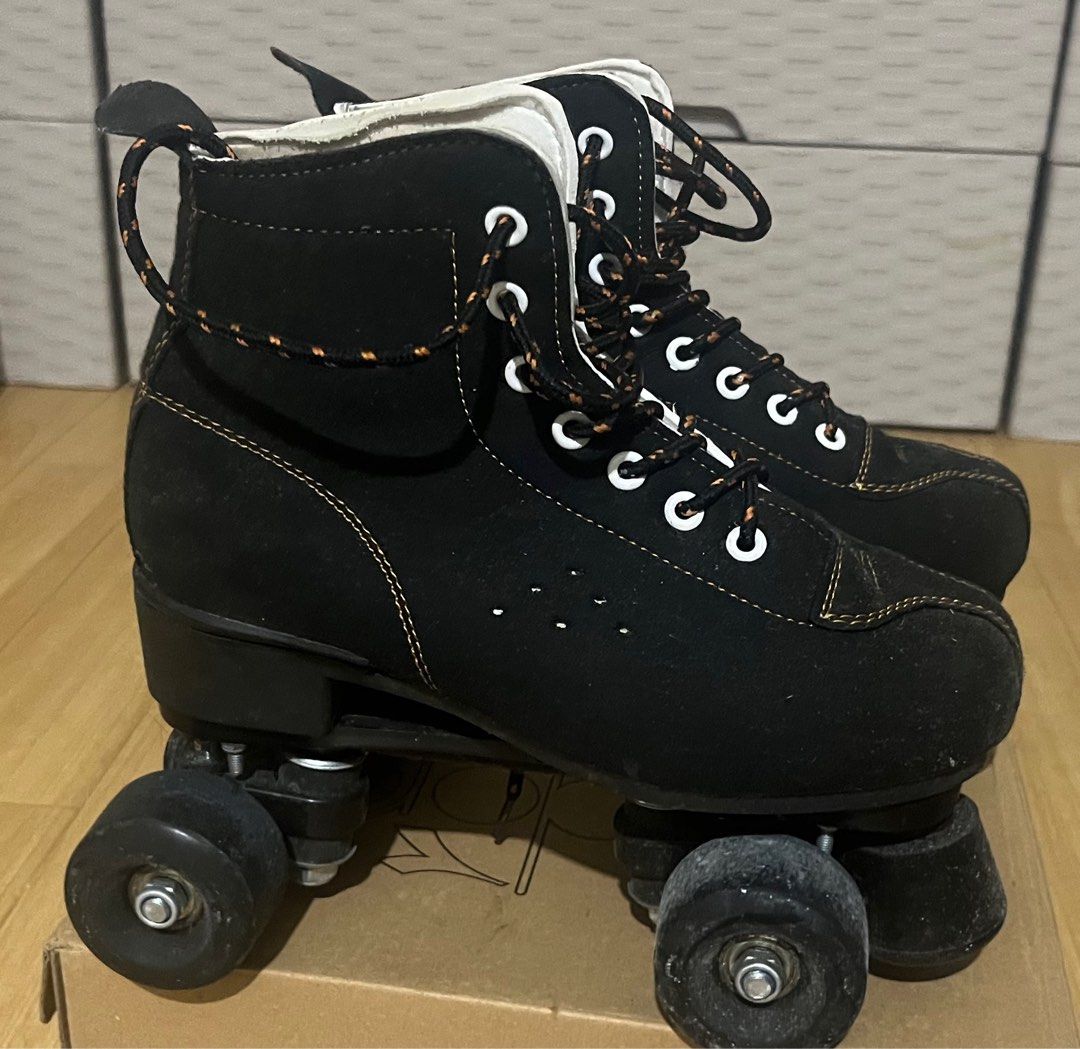 Black Roller Skates (Category: Skates, Rollerblades & Scooters) located in Manila. Submitted by homehustle (Listing ID 1412539297, Image 1). Description: - Black roller skates - Features orange accents - High-top design - Black wheels - White lining - Suede-like material.