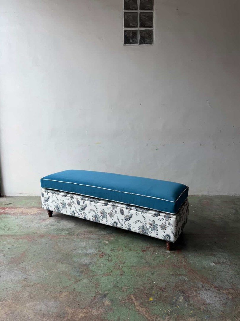 Blue and Floral Pattern Ottoman with Storage | Bedroom Bench (Category: Chairs) located in Manila. Submitted by waldorf024 (Listing ID 1412644350, Image 1). Description: Custom made from Barn and Alley for ₱35,000 selling it for ₱16,500 - Blue and Floral Pattern Ottoman - Features a stylish blue top and floral base. - Offers hidden storage space. - Modern and eclectic style. - Perfect for bedrooms or living areas..
