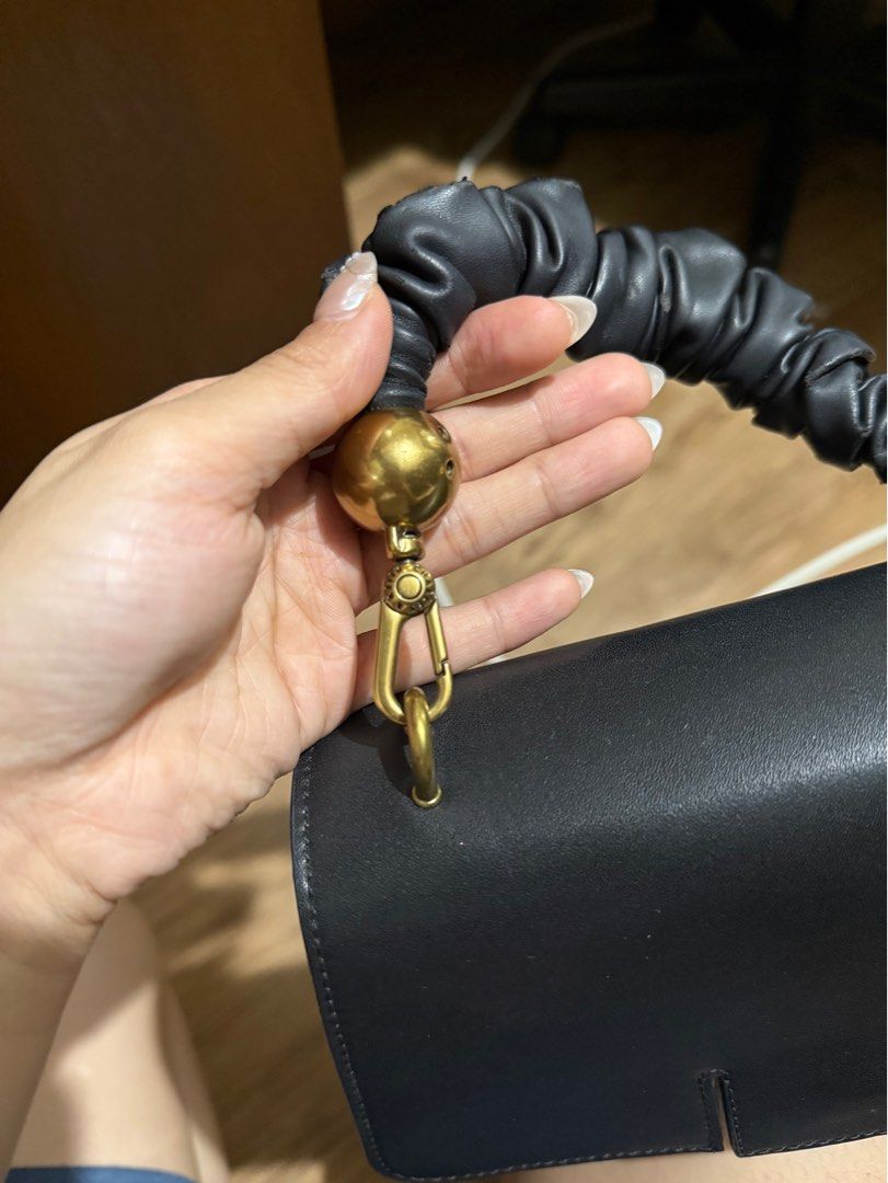 Charles & Keith Scrunchie Handle Bag (Category: Shoulder Bags) located in Manila. Submitted by threshold01 (Listing ID 1412659234, Image 3). Description: - Nagbabakbak yung handle, up close noticeable but not if malayuan (please see pics) - No strap - Charles and Keith bag - No box .