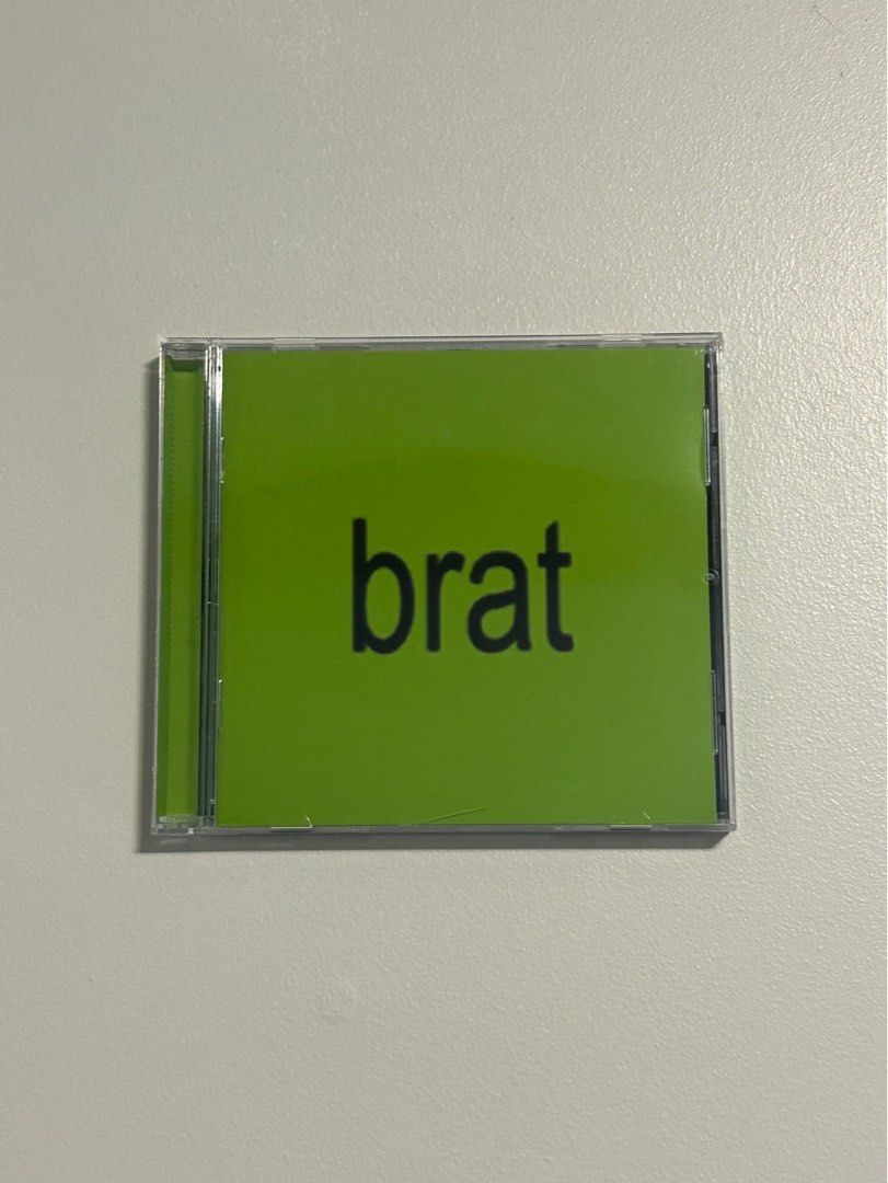 Charli XCX - brat (CD) (Category: Portable Audio Accessories) located in Manila. Submitted by tehexcx (Listing ID 1412650863, Image 1). Description: - has a small dent at the bottom center of the case - original price was 1,090 pesos RFS: i already have the brat remixes CD .