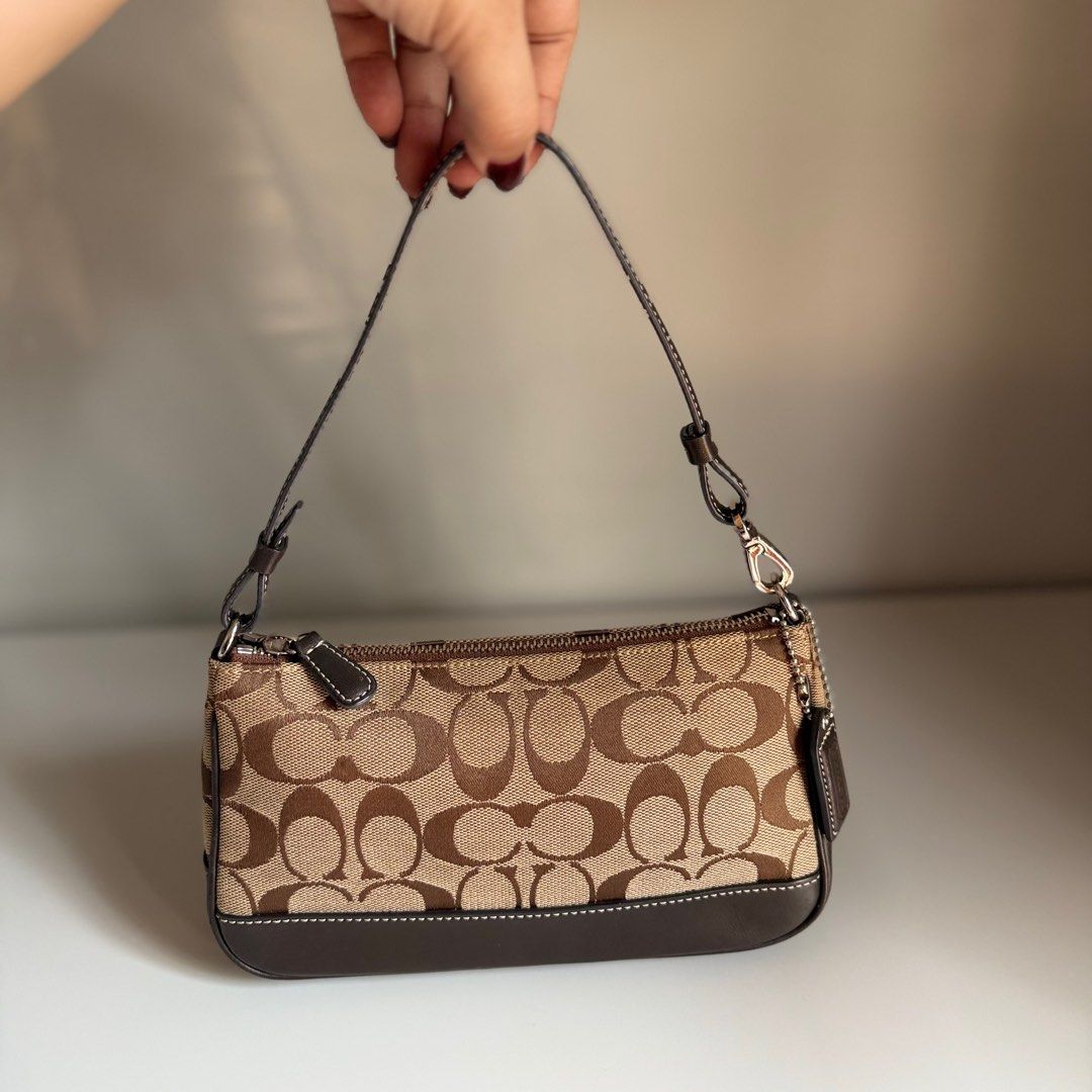 Coach Demi shoulder kili bag (Category: Luxury Bags & Wallets) located in Quezon City. Submitted by ksumer (Listing ID 1412673227, Image 2). Description: Used bag.
