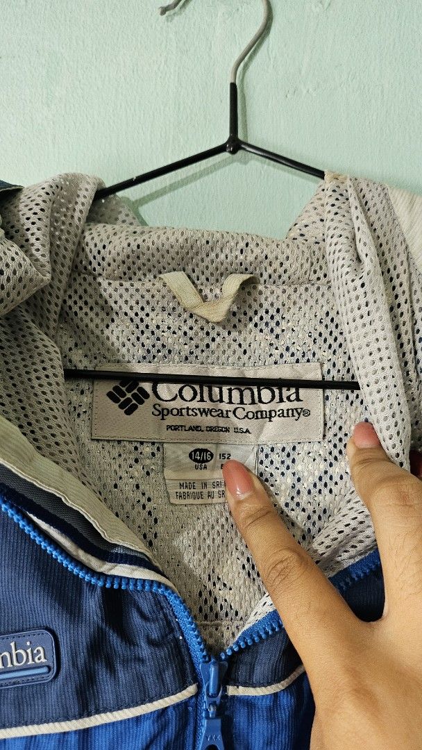 Columbia Packable Jacket - Large (Category: Coats, Jackets and Outerwear) located in Manila. Submitted by keenmountain-9d9d31 (Listing ID 1412540550, Image 2). Description: - Columbia packable jacket - Size: Large - Colors: Blue and navy with beige accents - Features: - Full zip closure - Hood - Multiple pockets - Mesh lining - Packable design.