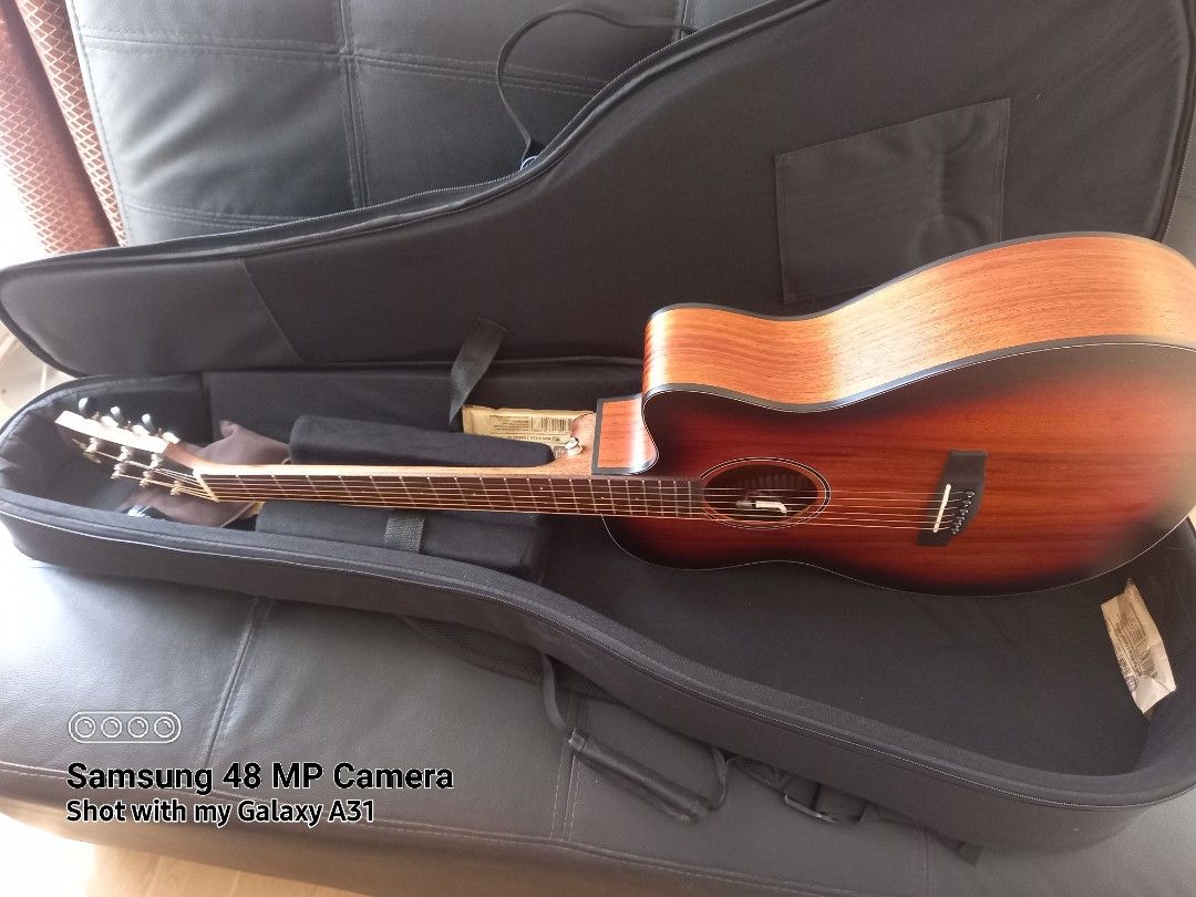 All-solid Cort Core Blackwood Acoustic-Electric Guitar (Category: Musical Instruments) located in Binan City. Submitted by graziosomoderato (Listing ID 1412372238, Image 3). Description: Cort Core all-solid blackwood OM Bone saddle and nut Like new, no signs of use, no scratches Setup: Low action Fretboard color: from original black to natural wood color Done at Elegee custom guitars Used at home only, sparingly, female owner. No issues Warm, bal