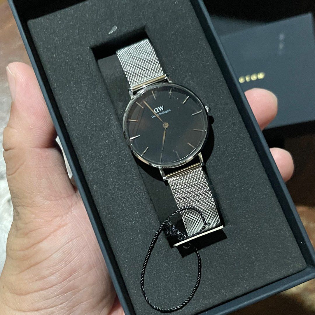 Daniel Wellington Petite Sterling Watch (Category: Women's Watches) located in Caloocan City. Submitted by earthissoft (Listing ID 1412683979, Image 2). Description: Daniel Wellington Petite Sterling Watch • Model / Art No.: DW00100162 • Size: 32mm • Material: Stainless Steel • Condition: Never used (display kept) • Battery: Needs replacement • SRP: ₱9,900 • Selling Price: ₱4,000 Reason for Selling: Never used, letting it go. Meetup / Delivery: A
