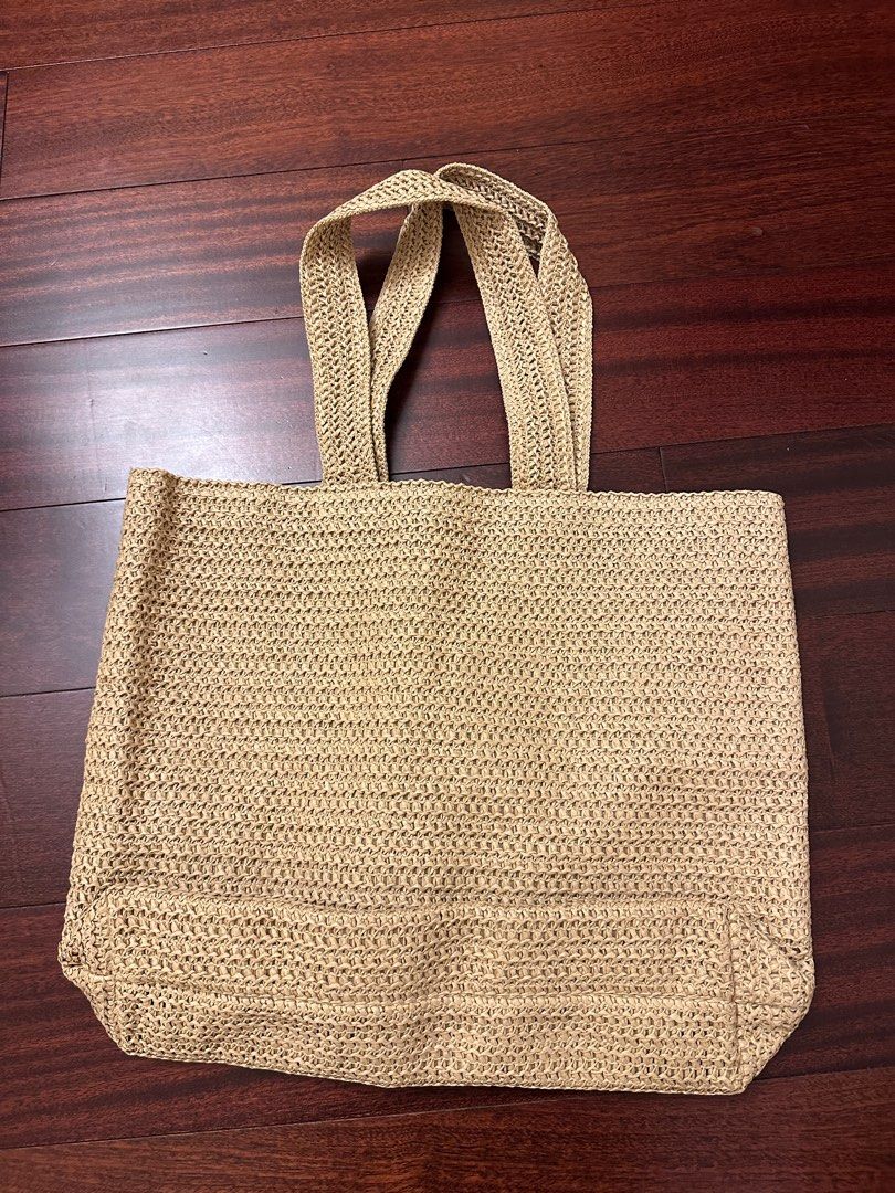 Dior Beauty Raffia Tote Bag (Category: Luxury Bags & Wallets) located in Makati City. Submitted by juju_08 (Listing ID 1412637335, Image 2). Description: - Dior tote bag - Woven design with embroidered Dior logo - Two top handles - Spacious interior - Neutral color for versatile styling - Light beige interior lining.
