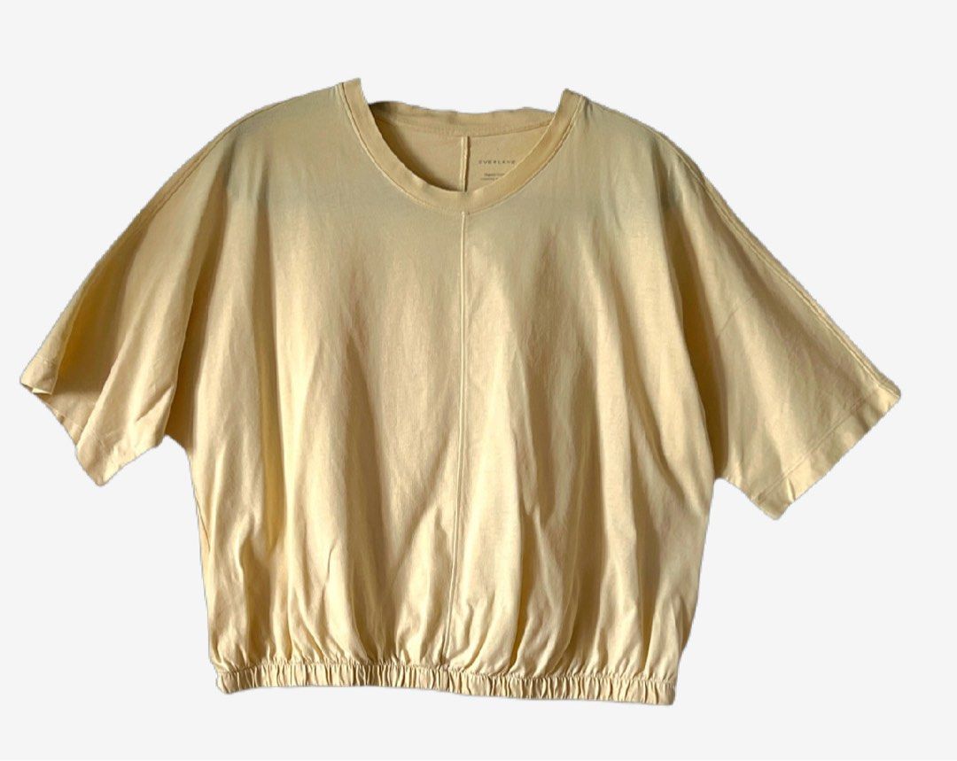 Everlane light yellow crop top with garterized hem (Category: Blouses) located in Makati City. Submitted by myechung (Listing ID 1412548644, Image 1). Description: No when worn photos please. What you see is what you get. First to pay basis. Payment via gcash the I can send address for pick-up. Thank you! .