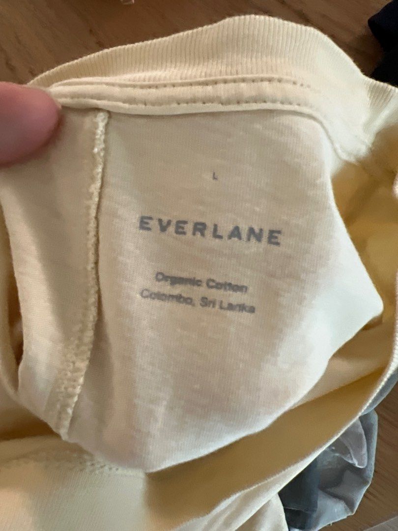 Everlane light yellow crop top with garterized hem (Category: Blouses) located in Makati City. Submitted by myechung (Listing ID 1412548644, Image 2). Description: No when worn photos please. What you see is what you get. First to pay basis. Payment via gcash the I can send address for pick-up. Thank you! .