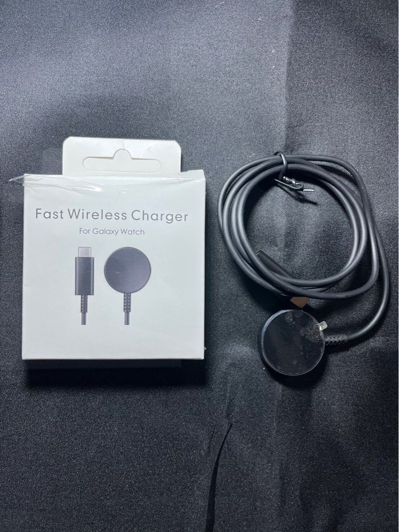 Fast Wireless Charger for Galaxy Watch (Category: Chargers & Cables) located in Manila. Submitted by nhh_accessories (Listing ID 1412691037, Image 1). Description: - Fast wireless charger for Galaxy Watch - Includes charging cable - Compatible with Galaxy Watch - Comes with the original box - Black color and round charging pad.