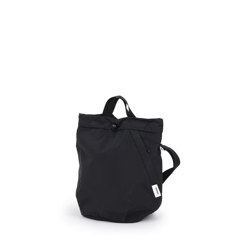 Hellolulu Cowan Crossbody Black 5L (Category: Shoulder Bags) located in Manila. Submitted by offthelabelmnl (Listing ID 1412676088, Image 3). Description: - Hellolulu Cowan Crossbody Bag - Color: Black - Capacity: 5L - Adjustable shoulder strap - Can be carried as a handheld, crossbody or shoulder bag - Front and back zippered pocket for small & versatile accessories like mobile phone and coin purse - Easy access main compartment with drawstring 