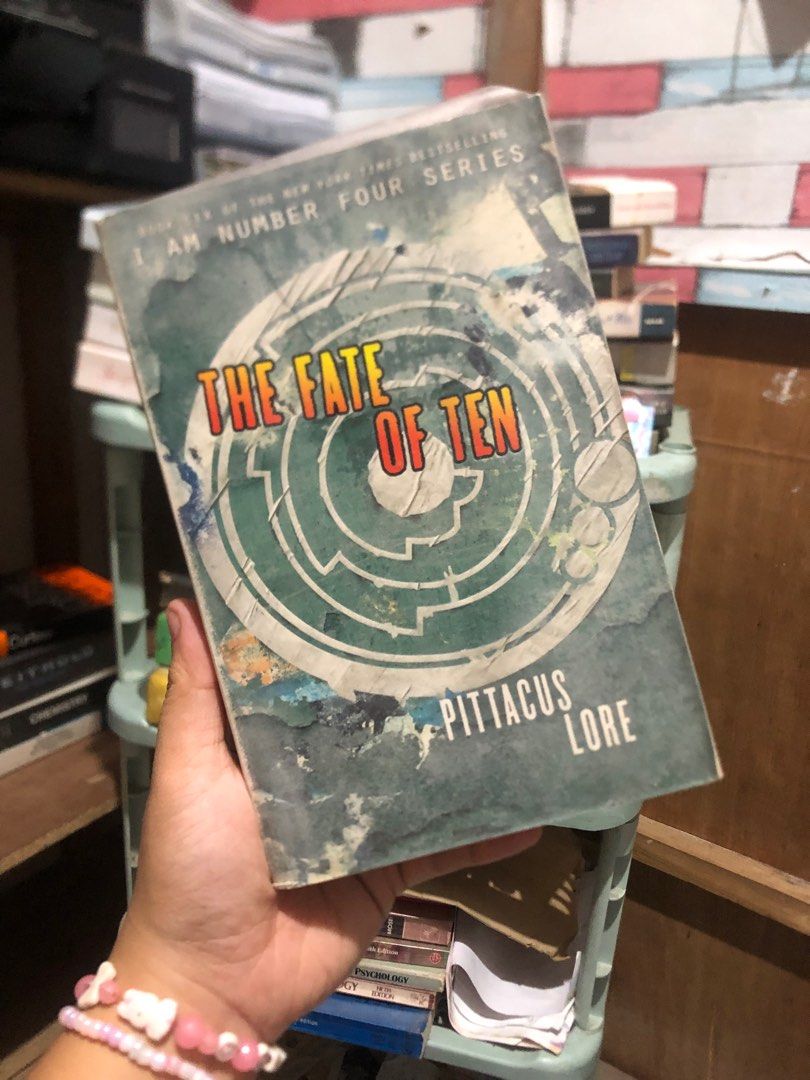 I Am Number Four Series by Pittacus Lore (Category: Storybooks) located in Baroy. Submitted by suzannejean (Listing ID 1412688820, Image 2). Description: Set of six books from the I Am Number Four series by Pittacus Lore. Titles include "The Fate of Ten", "The Rise of Nine", "The Revenge of Seven", "The Power of Six", "The Fall of Five", and "United as One". As you can see in the pictures, there’s visible foxing and tan edges. Buy at your own ris