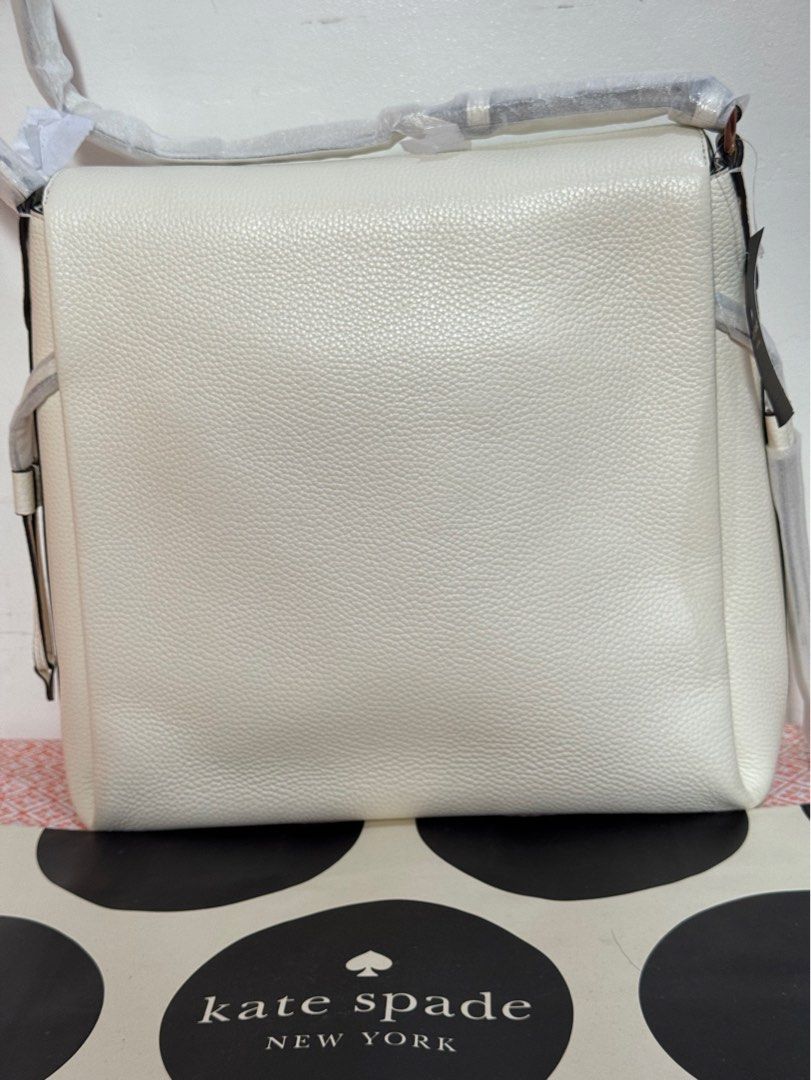 Kate Spade Dumpling Shoulder Bag (Category: Luxury Bags & Wallets) located in Quezon City. Submitted by branded_jo (Listing ID 1412670297, Image 2). Description: Original Kate Spade Dumpling Shoulder Bag Color White/Meringue Size Large Pebbled Leather Brand new with tag Bought in US Lalamove Ready Paper bag (till supplies last).