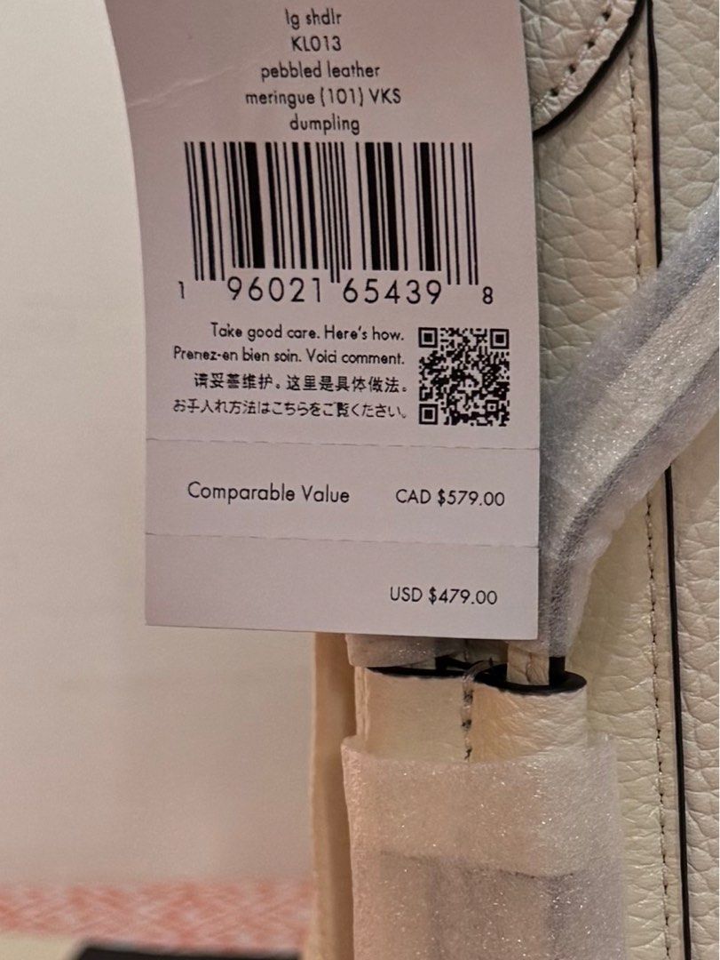 Kate Spade Dumpling Shoulder Bag (Category: Luxury Bags & Wallets) located in Quezon City. Submitted by branded_jo (Listing ID 1412670297, Image 3). Description: Original Kate Spade Dumpling Shoulder Bag Color White/Meringue Size Large Pebbled Leather Brand new with tag Bought in US Lalamove Ready Paper bag (till supplies last).