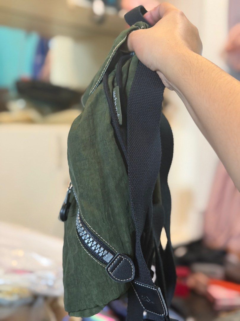 Kipling Mini Backpack - Acid Wash Green (Category: Backpacks) located in Manila. Submitted by sobandrea (Listing ID 1412541469, Image 3). Description: - Authentic Kipling mini backpack - Stylish green color - Zip closure - Adjustable straps - Front pocket - Includes Kipling monkey charm - Original tags included - Compact and lightweight.