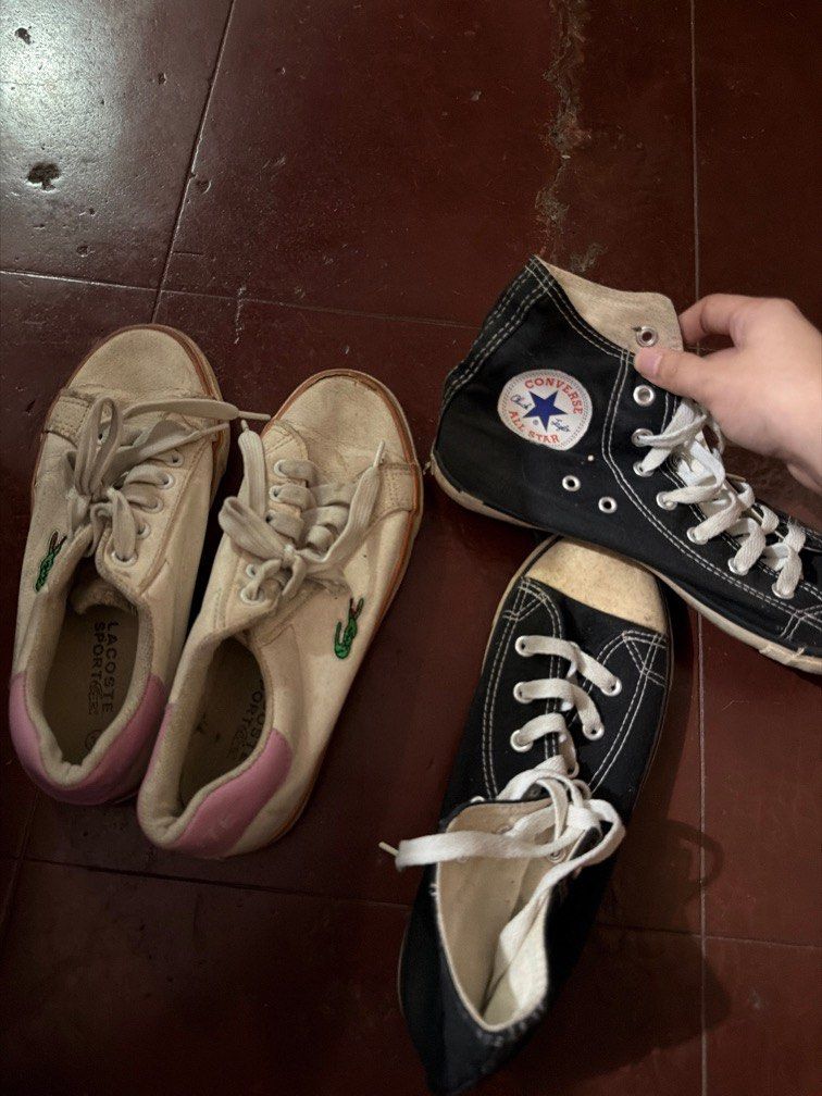Lacoste and Converse Sneakers - Shoes (Category: Sneakers) located in Quezon City. Submitted by velleshop (Listing ID 1412573434, Image 1). Description: - Lacoste Sport shoes: - Cream color with pink accents - Green crocodile logo - Converse All Star high-top sneakers: - Black color - White star logo - Both pairs include white laces..