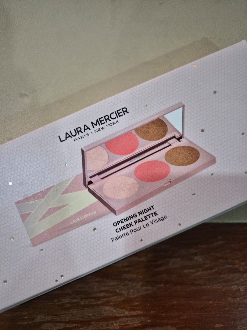 Laura Mercier Opening Night Cheek Palette (Category: Makeup) located in Quezon City. Submitted by mooneon (Listing ID 1412651476, Image 2). Description: - Laura Mercier Opening Night Cheek Palette - Features a mirror - Includes shades for the face - Comes in a pink and gold box.