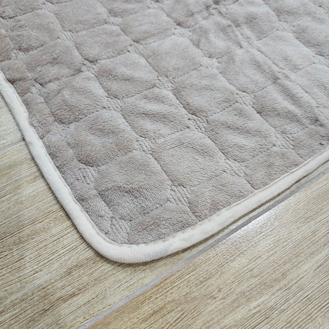 Light Brown Sofa Cover 70x150cm (Category: Sofas) located in Quezon City. Submitted by reply_1982 (Listing ID 1412620095, Image 3). Description: - Grey quilted sofa cover - Fits 3-seater sofas - White border design - Non-slip backing with flower patterns - Made of soft, plush material.