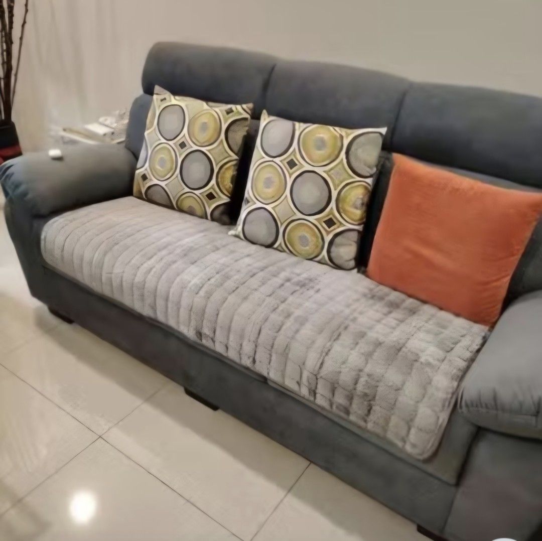 Light Brown Sofa Cover 70x150cm (Category: Sofas) located in Quezon City. Submitted by reply_1982 (Listing ID 1412620095, Image 1). Description: - Grey quilted sofa cover - Fits 3-seater sofas - White border design - Non-slip backing with flower patterns - Made of soft, plush material.
