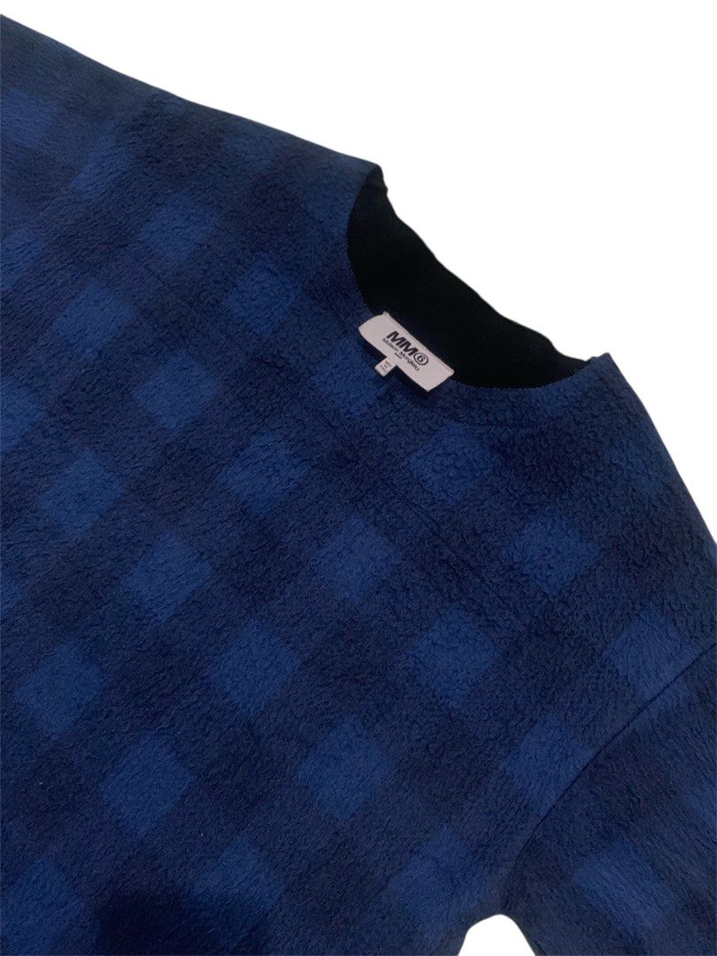MM6 Maison Margiela Blue Checkered Sweater (Category: Longsleeves) located in Manila. Submitted by haven_thrift (Listing ID 1412659877, Image 2). Description: - MM6 Maison Margiela sweater - Unique blue checkered pattern - Size: XS - Features: Crew neck, short sleeves, two pockets - Made in Italy - Lining: Black - Fabric Composition: Acrylic, Cotton, Polyester.