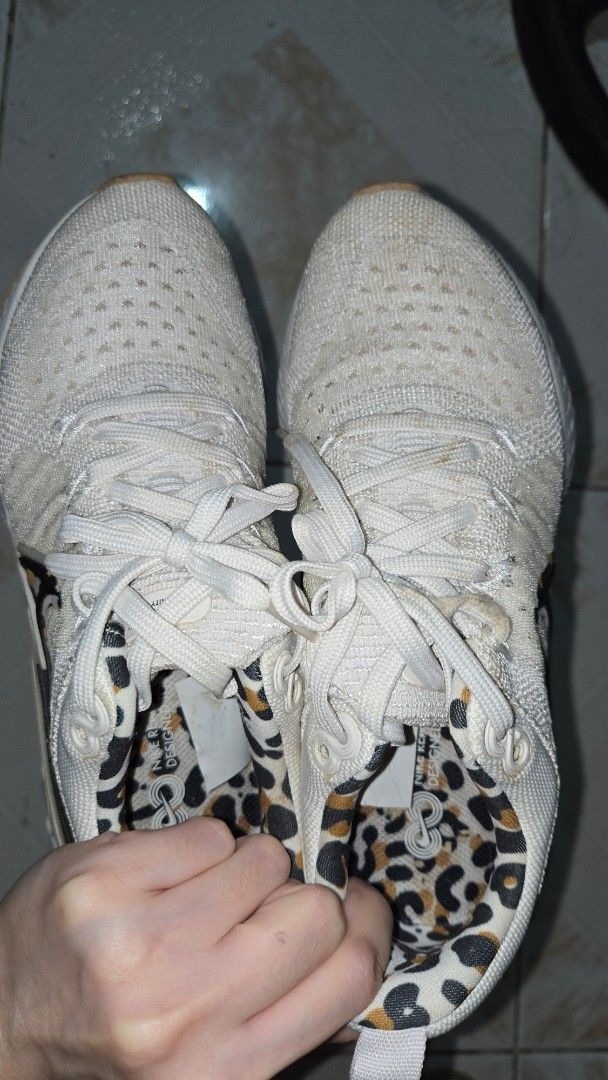Nike React Infinity Run FK 2 Women's Shoes (Category: Sneakers) located in Rizal. Submitted by kaj18 (Listing ID 1412623057, Image 1). Description: Condition:5/10 Issue:lace is worn out -you may replace it - Size: US 5.5, UK 3, EUR 36, 22.5 cm - White upper with leopard print interior - White and brown soles - Pre-owned, showing signs of wear.