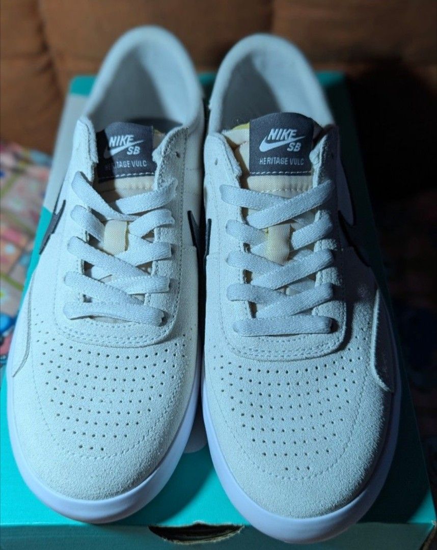 Nike SB Heritage Vulc Sneakers (Category: Sneakers) located in Pasay City. Submitted by jaydee05 (Listing ID 1412613001, Image 2). Description: - Nike SB Heritage Vulc sneakers - Color: Grey and White - Size: US 7 / EUR 40 - Features: Suede and canvas upper, white sole - Details: Nike SB logo on tongue and side - Condition: New, unworn.