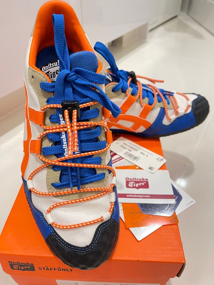 Onitsuka Tiger Serrano White/Habanero Sneakers - US 8 (Category: Sneakers) located in Singapore. Submitted by waysg (Listing ID 1412677304, Image 1). Description: - Onitsuka Tiger Serrano sneakers - Eye-catching white, orange, and blue color scheme - US size 8, Euro 41.5, UK 7 - Includes original box and tags - Adds a vibrant pop of color to any outfit.