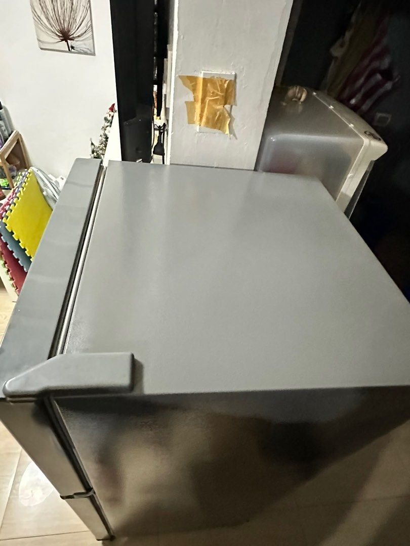 Panasonic Two-Door Refrigerator (Category: Refrigerators and Freezers) located in Cavite. Submitted by villary (Listing ID 1412530106, Image 3). Description: - Panasonic two-door refrigerator - Freezer on top, refrigerator below - Dark gray exterior - Clean and well-maintained interior - Standard plug - In good working condition.