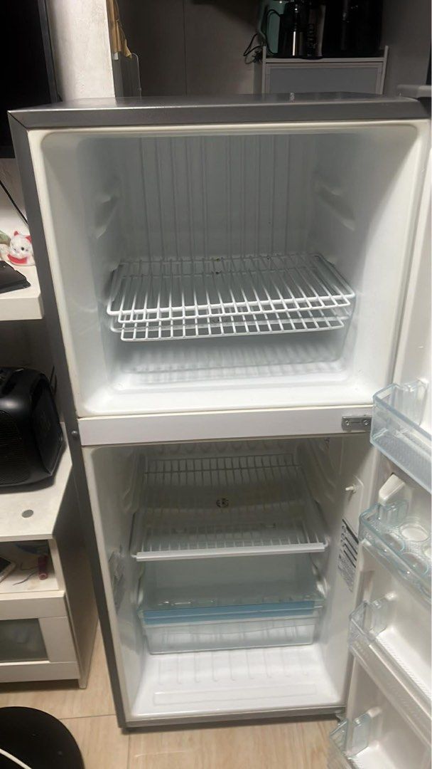 Panasonic Two-Door Refrigerator (Category: Refrigerators and Freezers) located in Cavite. Submitted by villary (Listing ID 1412530106, Image 2). Description: - Panasonic two-door refrigerator - Freezer on top, refrigerator below - Dark gray exterior - Clean and well-maintained interior - Standard plug - In good working condition.