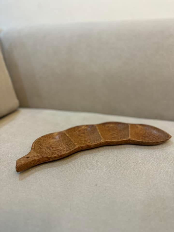 Peapod sensory tray wooden (Category: Other Home Decor) located in Manila. Submitted by theeditmarket (Listing ID 1412566694, Image 1). Description: - Bean-shaped wooden tray - Features four compartments - Natural wood grain finish.