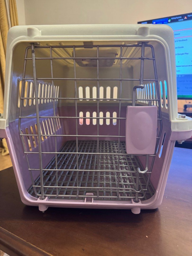 Pet Carrier - Small Size (Category: Homes & Other Pet Accessories) located in Makati City. Submitted by danandy12 (Listing ID 1412641664, Image 2). Description: - Small pet carrier - White and purple color combination - Secure metal door - Ventilation slots for airflow - Removable floor for easy cleaning - Designed for safe and comfortable pet travel Perfect condition 🫶🏻 RFS: Decluttering.