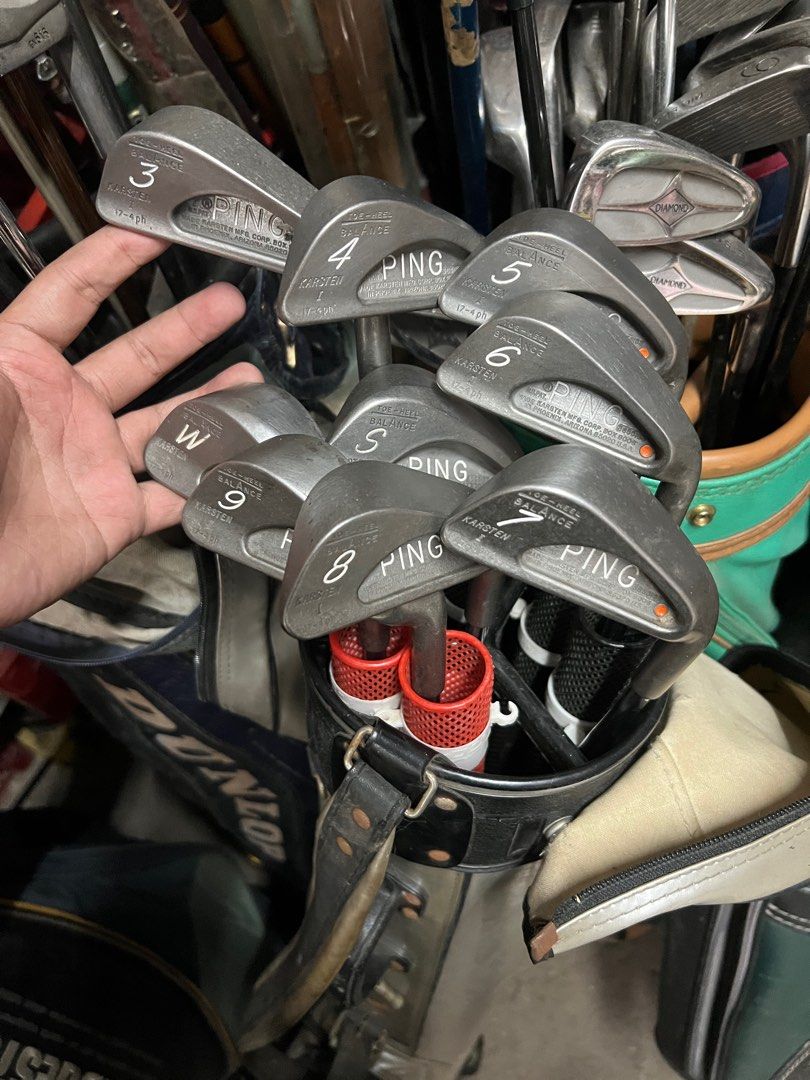 Ping Karsten Golf Club Set (Orange dot) (Category: Golf) located in Manila. Submitted by horijapansurplus (Listing ID 1412537630, Image 3). Description: Complete set of Ping Karsten golf clubs. Includes irons 3, 4, 5, 6, 7, 8, 9, S, and W. The clubs have steel shafts and Ping grips. The set is in a golf bag, which is included in the sale. Pickup location: 028 galvez street santa lucia novaliches QC.